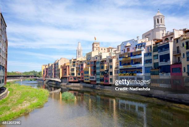 views of river onyar and colorful houses in girona city, catalonia, spain. - fiume onyar foto e immagini stock