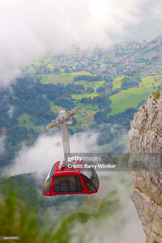 View from above of red cableway at Mt. Pilatus