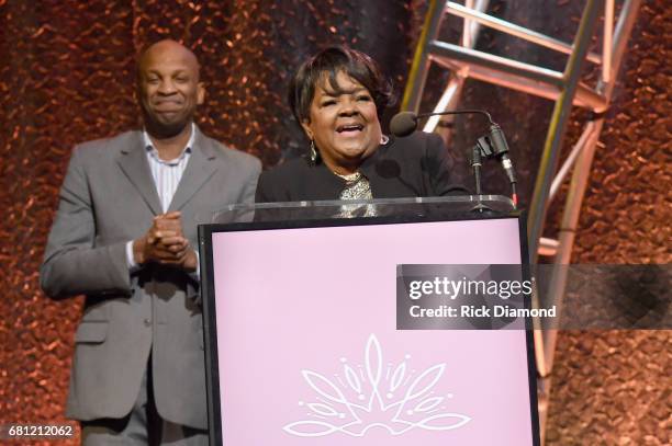 Singer Donnie McClurkin presents the award to honoree Dr. Shirley Caesar on stage at the GMA Honors on May 9, 2017 in Nashville, Tennessee.