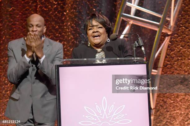 Singer Donnie McClurkin presentsthe award to honoree Dr. Shirley Caesar on stage at the GMA Honors on May 9, 2017 in Nashville, Tennessee.