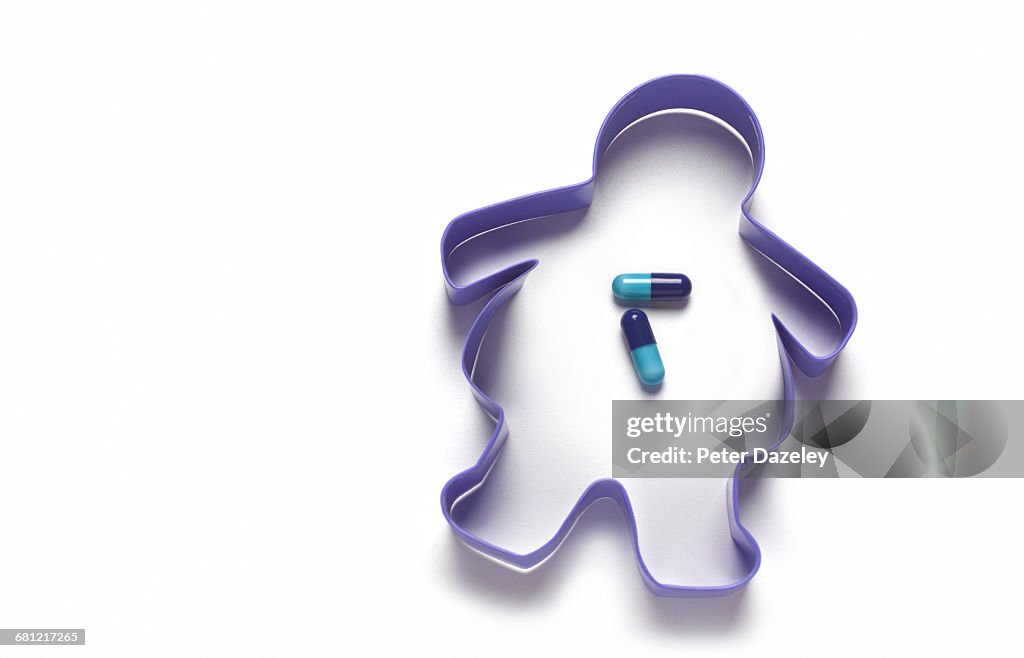 Overweight cookie cutter with diet pills