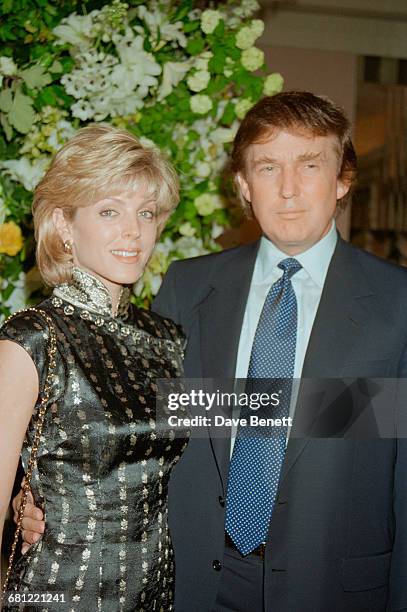 American real estate magnate Donald Trump with his second wife, Marla Maples, at Claridge's hotel, London, to host a launch event for his New York...