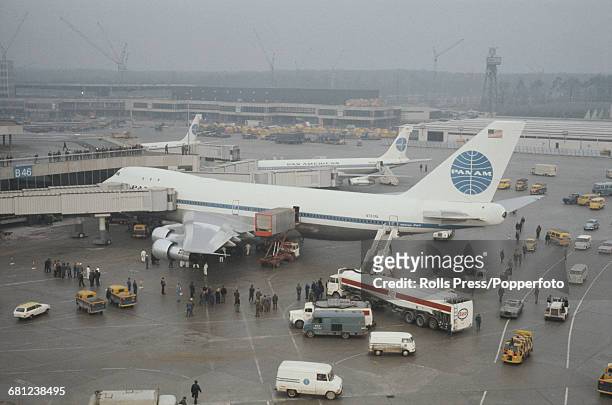 View of a Pan American World Airways Boeing 747-100 Jumbo Jet aircraft being serviced at Frankfurt Airport in West Germany after completing one of...