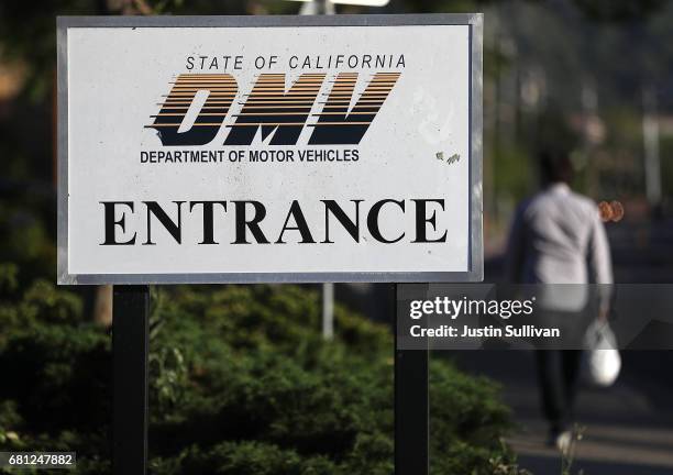 Sign is posted in front of a California Department of Motor Vehicles office on May 9, 2017 in Corte Madera, California. The California Department of...