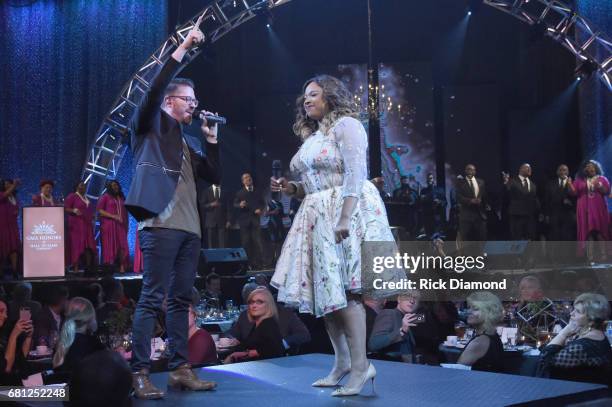 Singer-songwriters Danny Gokey and Kierra Sheard perform on stage at the GMA Honors on May 9, 2017 in Nashville, Tennessee.