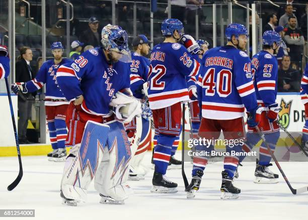 Henrik Lundqvist of the New York Rangers reacts after losing to the Ottawa Senators with a score of 4 to 2 in Game Six of the Eastern Conference...