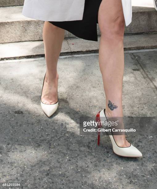Actress Carla Gugino, shoe and tattoo detail, is seen leaving David Lynch Foundation Women of Vision Awards at 583 Park Avenue on May 9, 2017 in New...