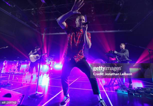 Wayne Sermon, Dan Reynolds and Ben McKee of Imagine Dragons perform at the Evolve Tour and Album Live Stream Event at YouTube Space LA on May 9, 2017...