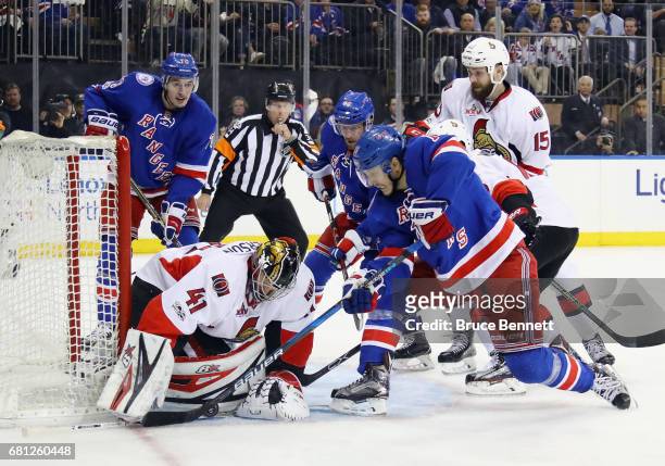Jesper Fast of the New York Rangers is stopped by Craig Anderson of the Ottawa Senators during the second period in Game Six of the Eastern...