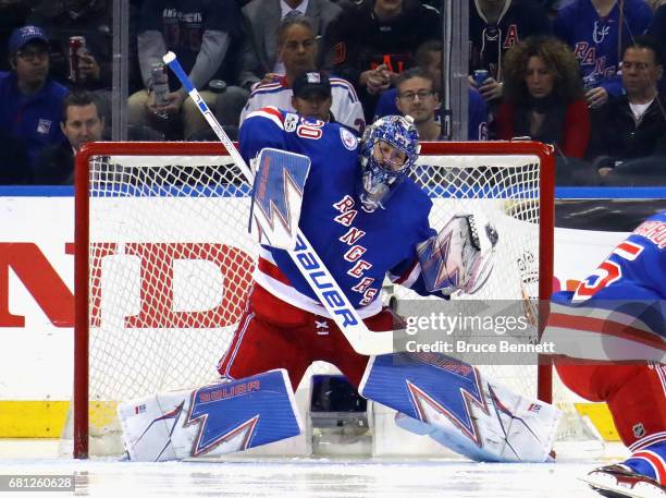 Henrik Lundqvist of the New York Rangers makes the second period save against the Ottawa Senators in Game Six of the Eastern Conference Second Round...