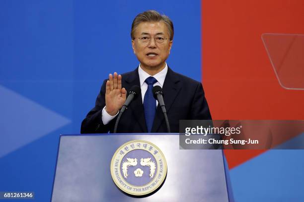 South Korea's new President Moon Jae-In takes the oath during his presidential inauguration ceremony at National Assembly on May 10, 2017 in Seoul,...