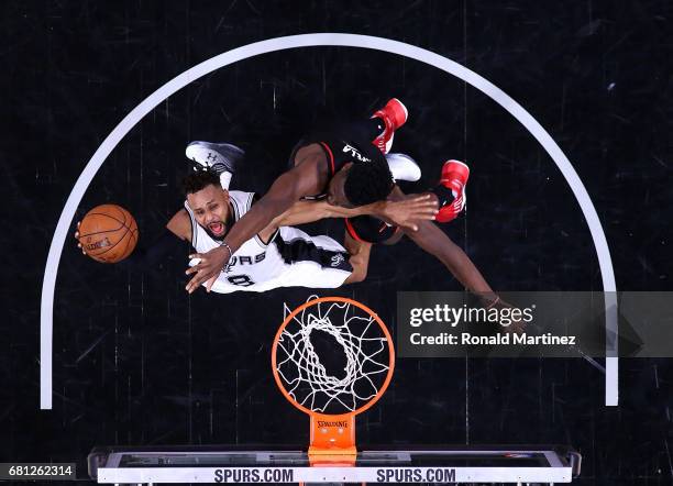 Patty Mills of the San Antonio Spurs takes a shot against Clint Capela of the Houston Rockets during Game Five of the Western Conference Semi-Finals...