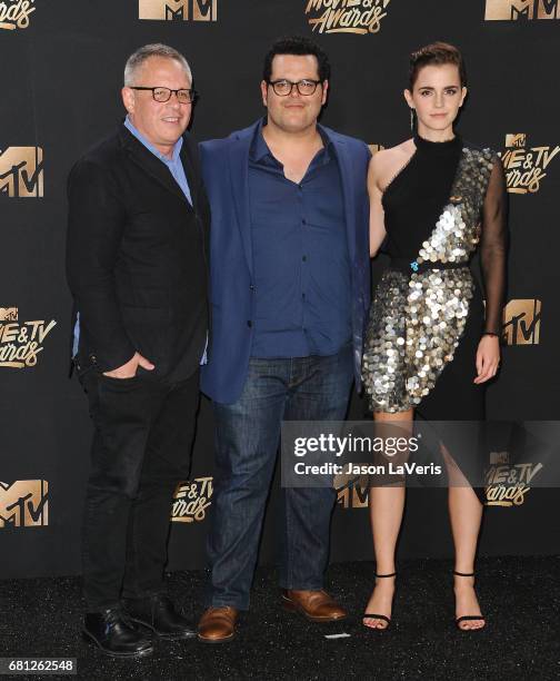 Director Bill Condon and actors Josh Gad and Emma Watson, winners of Movie of the Year for 'Beauty and the Beast', pose in the press room at the 2017...