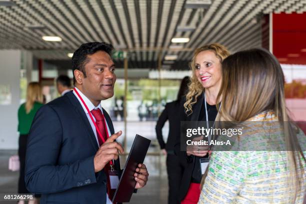 business people chatting - red tie stock pictures, royalty-free photos & images