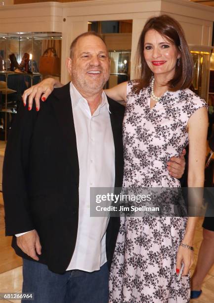 Film producer Harvey Weinstein poses with writer Plum Sykes during her book launch celebration for "Party Girls Die In Pearls" at Brooks Brothers on...