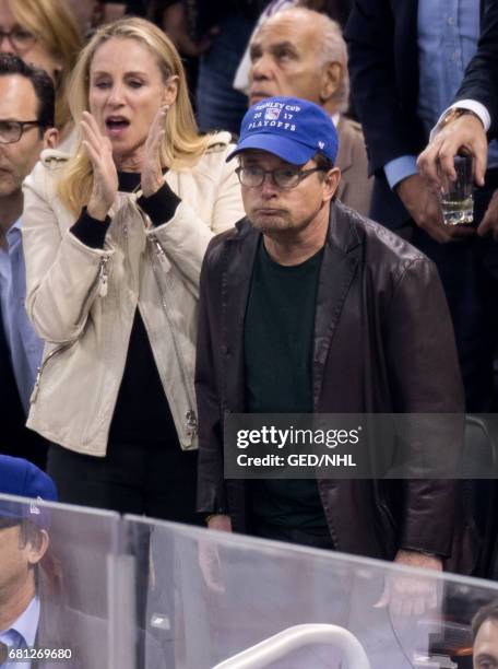 Tracy Pollan and Michael J. Fox attend Ottawa Senators Vs. New York Rangers 2017 Playoff Game on May 9 at Madison Square Garden in New York City.