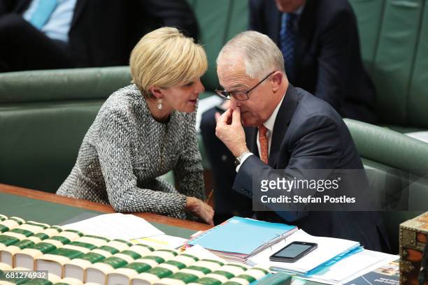 Prime Minister Malcolm Turnbull speaks with Minister for Foreign Affairs Julie Bishop during question time at Parliament House on May 10, 2017 in...