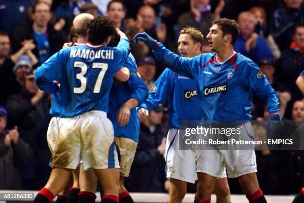 Rangers' players celebrate the winning goal against Motherwell scored by Shota Arveladze