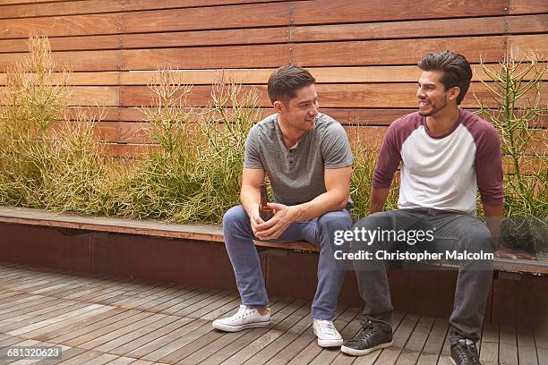 two men hanging out - fences 2016 film stock-fotos und bilder