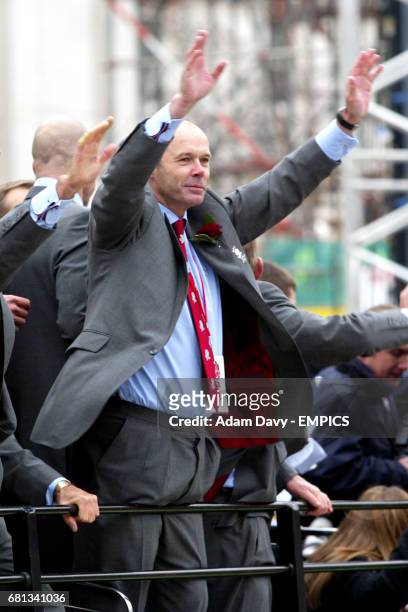 England coach Clive Woodward waves to the fans as he soaks up the atmosphere of the day