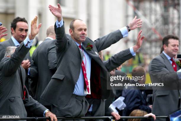 England coach Clive Woodward waves to the fans as he soaks up the atmosphere of the day