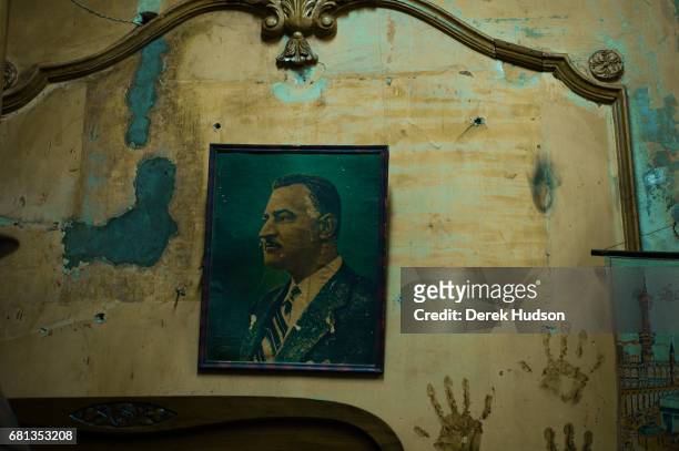View of a framed portrait of former Egyptian president Gamal Abdel Nasser on the wall of an antique shop, Alexandria, Egypt, December 15, 2009.