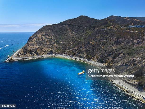 avalon's famed yellow submarine out at sea. - avalon catalina island california stock pictures, royalty-free photos & images
