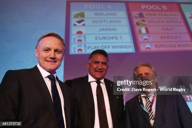 Joe Schmidt, Head Coach of Ireland, Jamie Joseph, Head Coach of Japan and Scott Johnson, Performance Director of Scotland pose during the Rugby World...