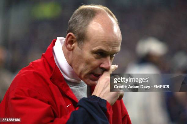 England's Clive Woodward looks dejected after the defeat to France