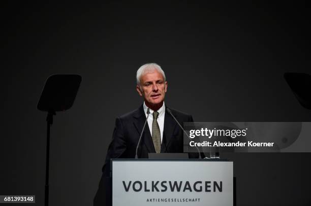 Matthias Mueller, CEO of German carmaker Volkswagen AG, speaks during company's annual general shareholders meeting on May 10, 2017 in Hanover,...