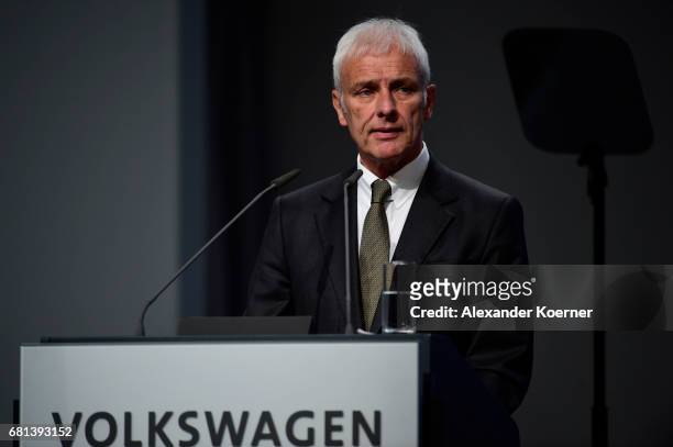 Matthias Mueller, CEO of German carmaker Volkswagen AG, speaks during company's annual general shareholders meeting on May 10, 2017 in Hanover,...
