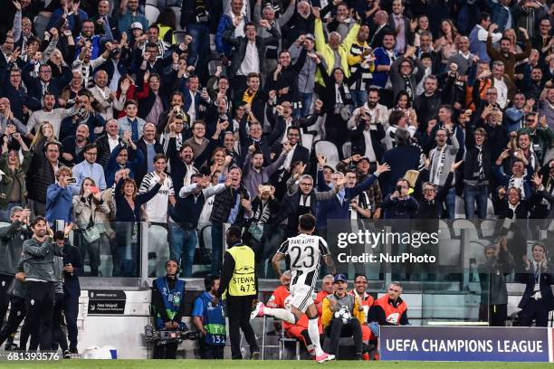 Daniel Alves of Juventus celebrates scoring second goal during the UEFA Champions League Semi-Final game 2 match between Juventus and Monaco at the...