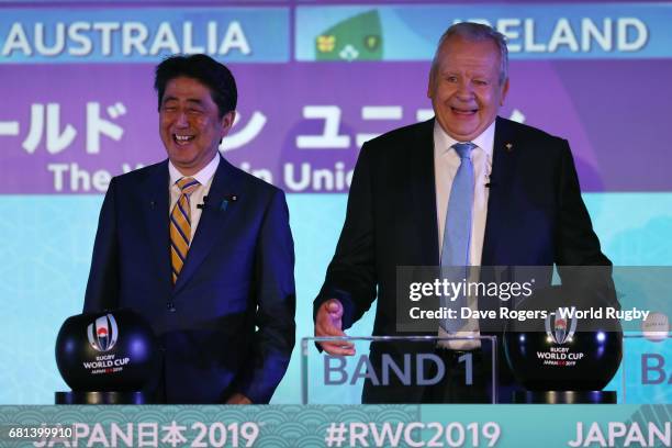 Shinzo Abe, Prime Minister of Japan and Bill Beaumont, Chairman of World Rugby via Getty Images address the audience during the Rugby World Cup 2019...