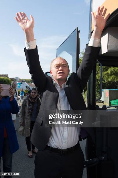 Leader of the Liberal Democrats Tim Farron waves as he visits Lewannick Primary School near Launceston on May 10, 2017 in Cornwall, England. The...