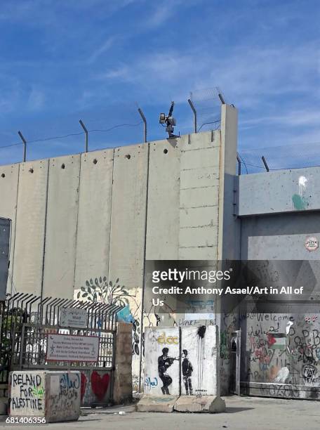 Israeli-built West Bank Wall surrounding Bethlehem with mural art of Banksy, Bethlehem, West Bank, Israel , Israel in March 2017