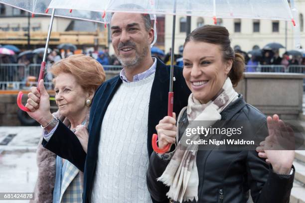 Lady Elizabeth Shakerley of Great Britain, Carlos Euguster and Desiree Kogevinas of Belgium attend a lunch on the Royal yacht, Norge, on the occasion...