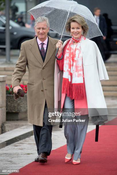 King Philippe and Queen Mathilde of Belgium, leave to attend a lunch on the Norwegian Royal Yacht "Norge" as part of the celebrations of the 80th...