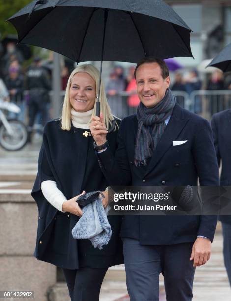 Crown Princess Mette-Marit of Norway and Crown Prince Haakon of Norway leave to attend a lunch on the Norwegian Royal Yacht "Norge" as part of the...