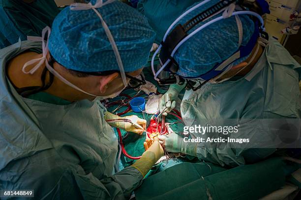 cardiac surgery-heart valve replacement - heart surgery stock pictures, royalty-free photos & images