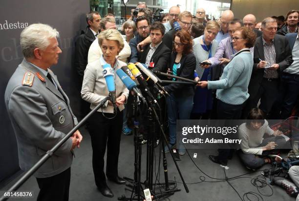 Volker Wieker, chief of staff of the German military , and Defense Minister Ursula von der Leyen speak to the media during a special meeting of a...