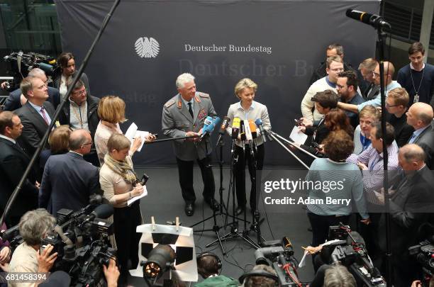 Volker Wieker, chief of staff of the German military , and Defense Minister Ursula von der Leyen speak to the media during a special meeting of a...