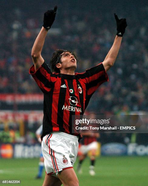 Milan's Kaka celebrates scoring his first of two goals in AC Milan's 4-1 win over Deportivo La Coruna