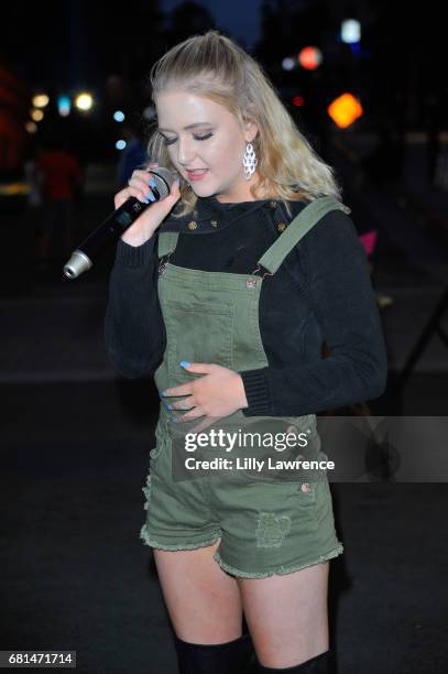 Singer Mahkenna performs at Mother's Day Night Out Concert at Surf City Nights on May 9, 2017 in Huntington Beach, California.