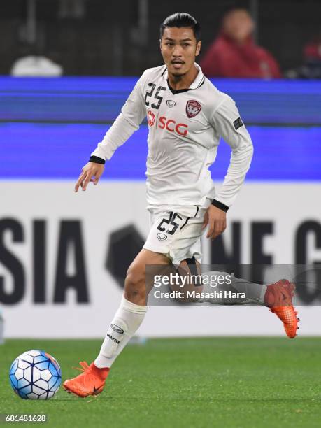 Adison Promrak of Muangthong United in action during the AFC Champions League Group E match between Kashima Antlers and Muangthong United at Kashima...