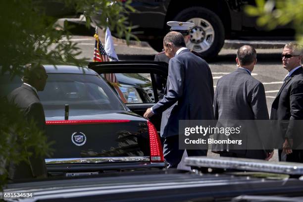 Sergei Lavrov, Russia's foreign minister, center, leaves after a meeting U.S. President Donald Trump, not pictured, near the West Wing of the White...