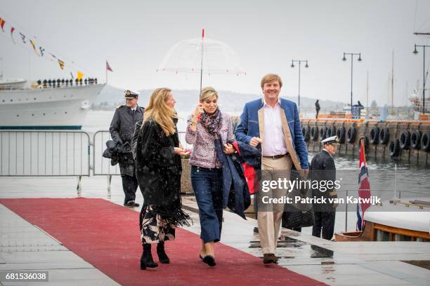 King Willem-Alexander, Queen Maxima and Princess Mabel of Orange-Nassau attend a lunch on the Royal yatch, Norge, on the ocassion of the celebration...