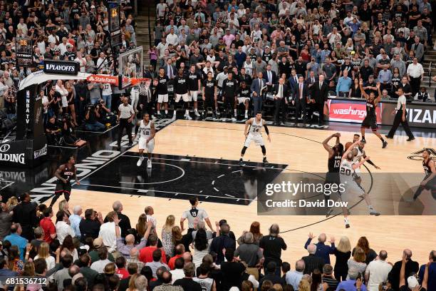 Manu Ginobili of the San Antonio Spurs blocks the shot of James Harden of the Houston Rockets in Game Five of the Western Conference Semifinals...