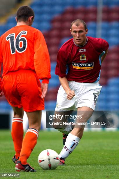 Burnley's Ryan Townsend comes up against Dundee United's Jim McIntyre