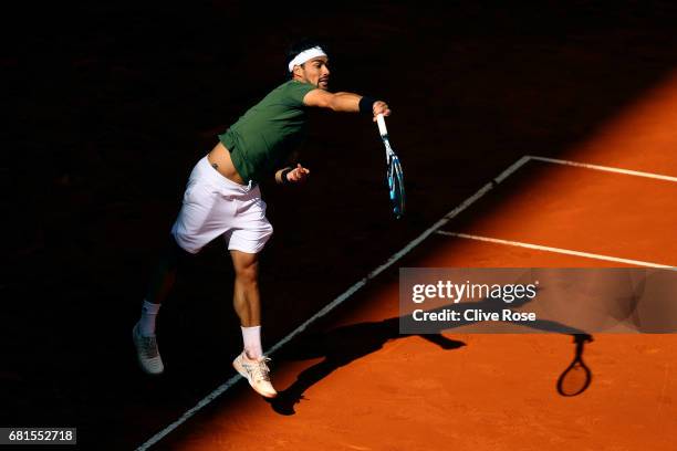 Fabio Fognini of Italy in action during his match against Rafael Nadal of Spain on day five of the Mutua Madrid Open tennis at La Caja Magica on May...