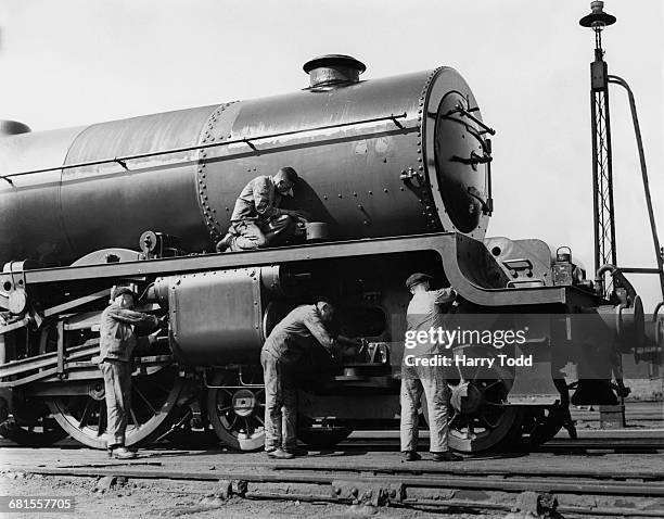 The LMS William Stanier designed Princess Royal Class 4-6-0 express steam locomotive Princess Royal being painted at the Crewe railway works after...